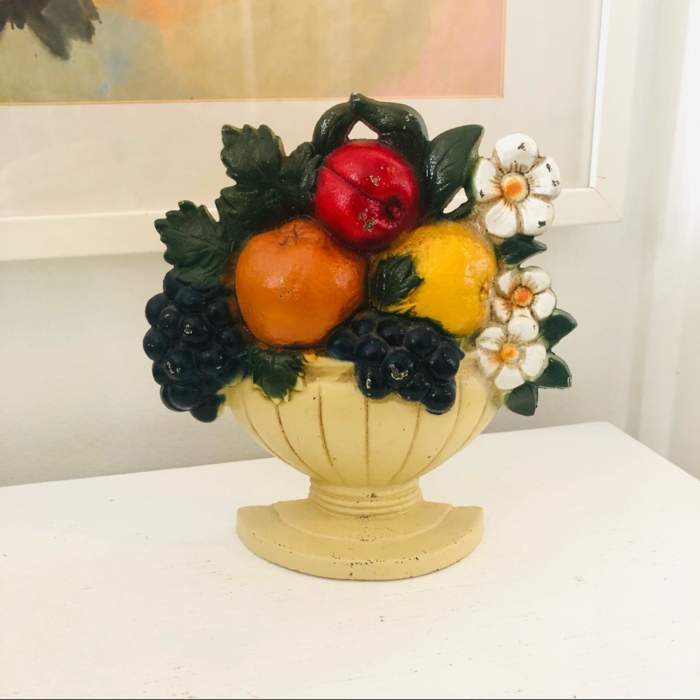 Vintage cast iron painted stamped bouquet doorstop